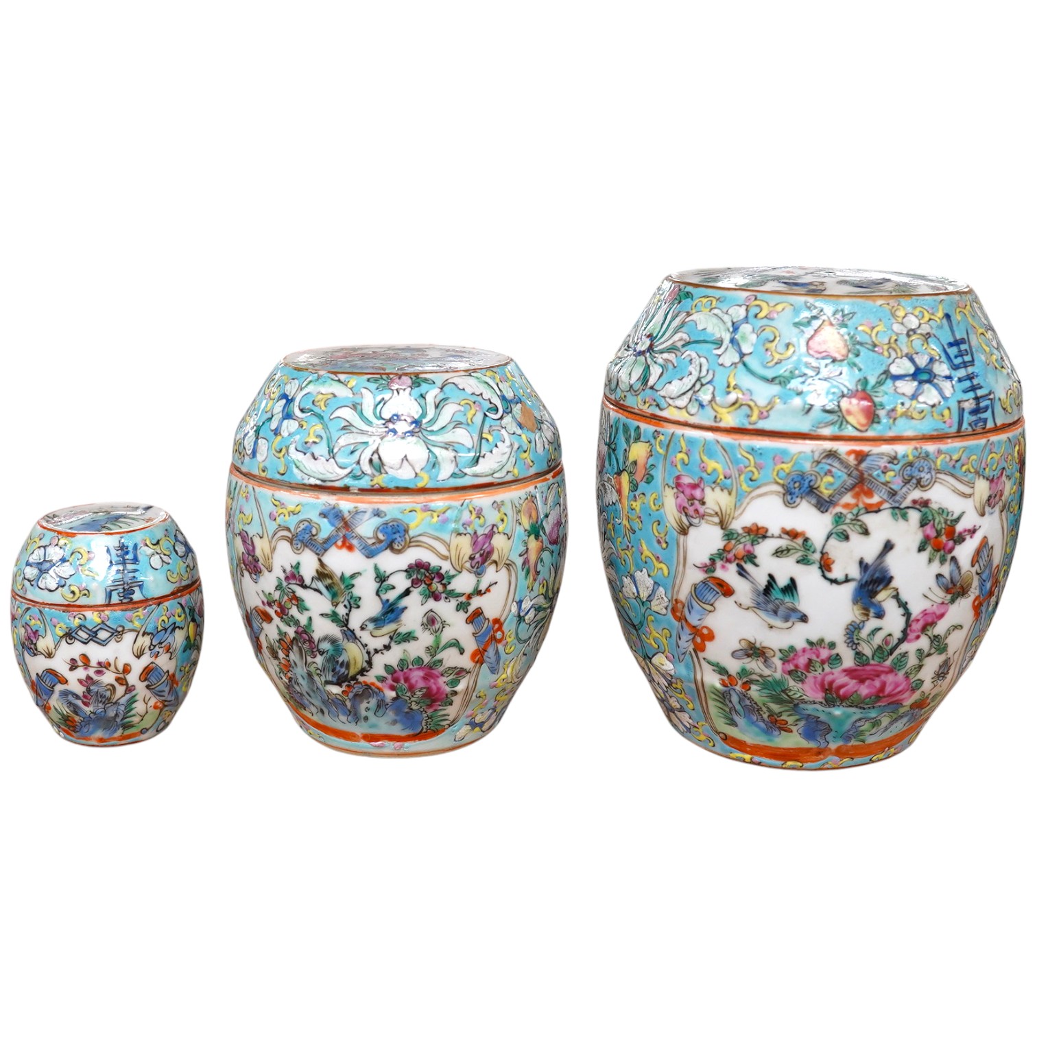 A complete Chinese porcelain nest of five enamelled porcelain barrel shaped boxes, c.1900, largest 12cm high. Condition - fair, some minor chipping